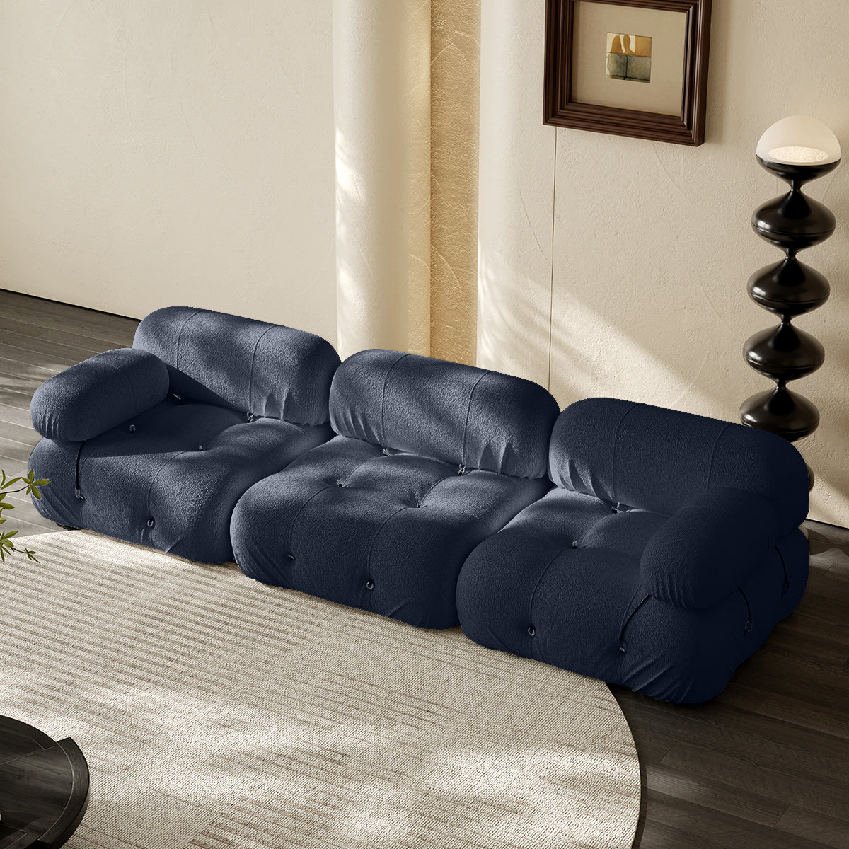 3-seater vacuum packed compression sofa in blue, tufted cushions and rounded armrests