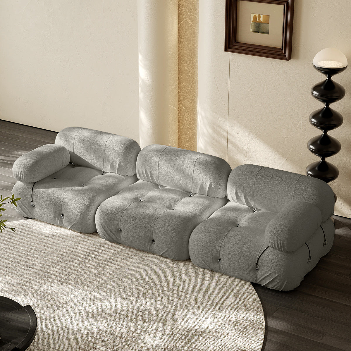 3-seater vacuum packed compression sofa in light gray, tufted cushions and rounded armrests