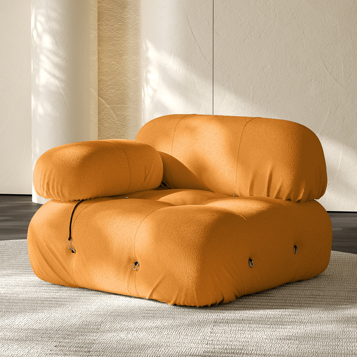 Golden orange sofa corner module with rounded backrest and seat, button-tufted details