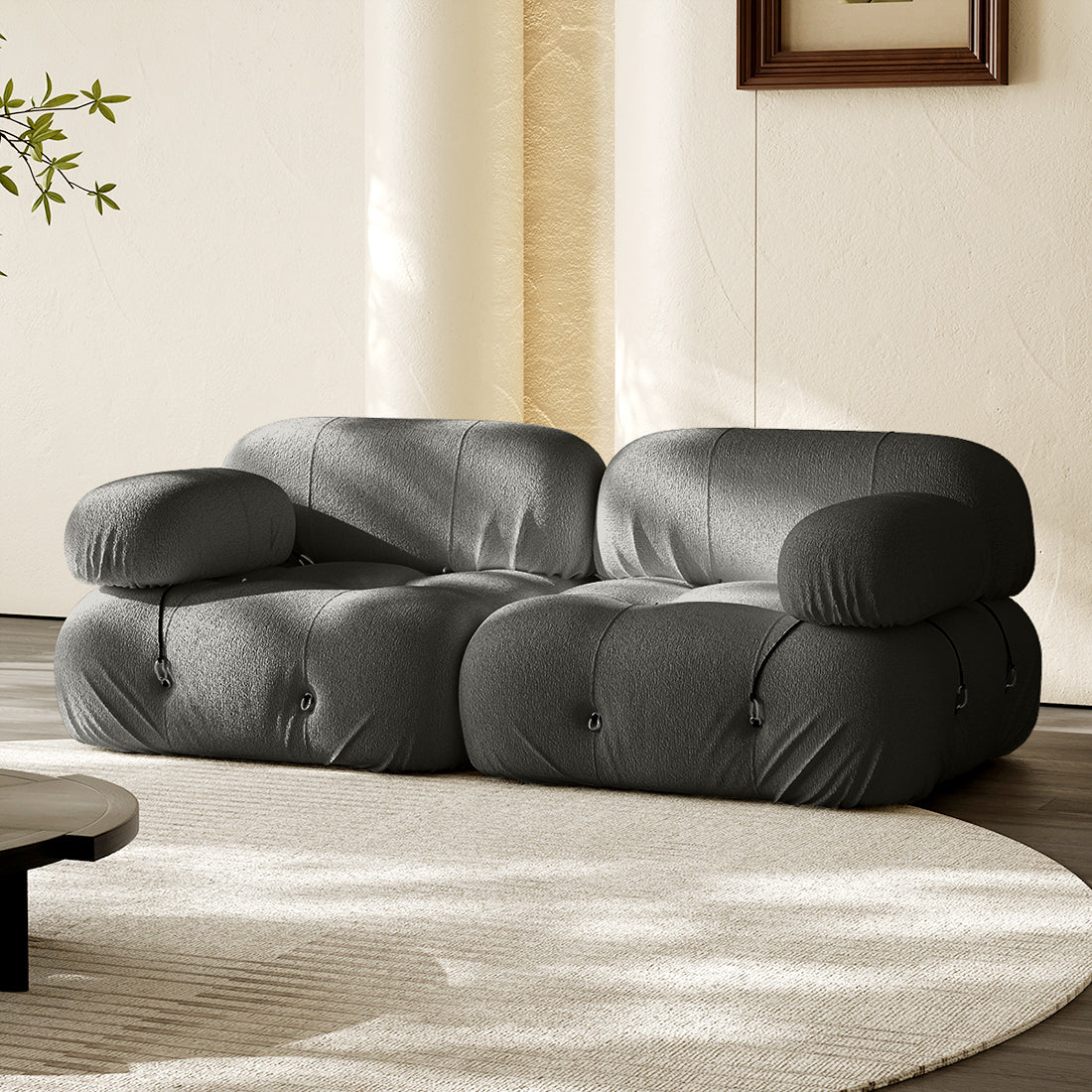 Hiksnra Camaleonda sofa.2 seater in dark gray chenille,with soft,supportive foam and a flexible modular design.