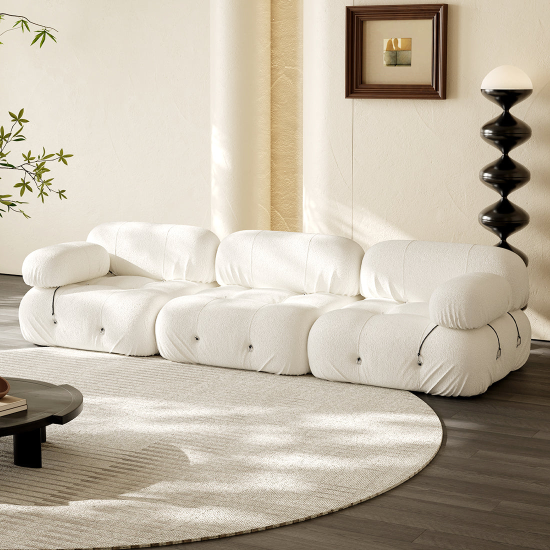 Hiksnra three-seat floor sofa in off-white fabric with plush segmented cushions