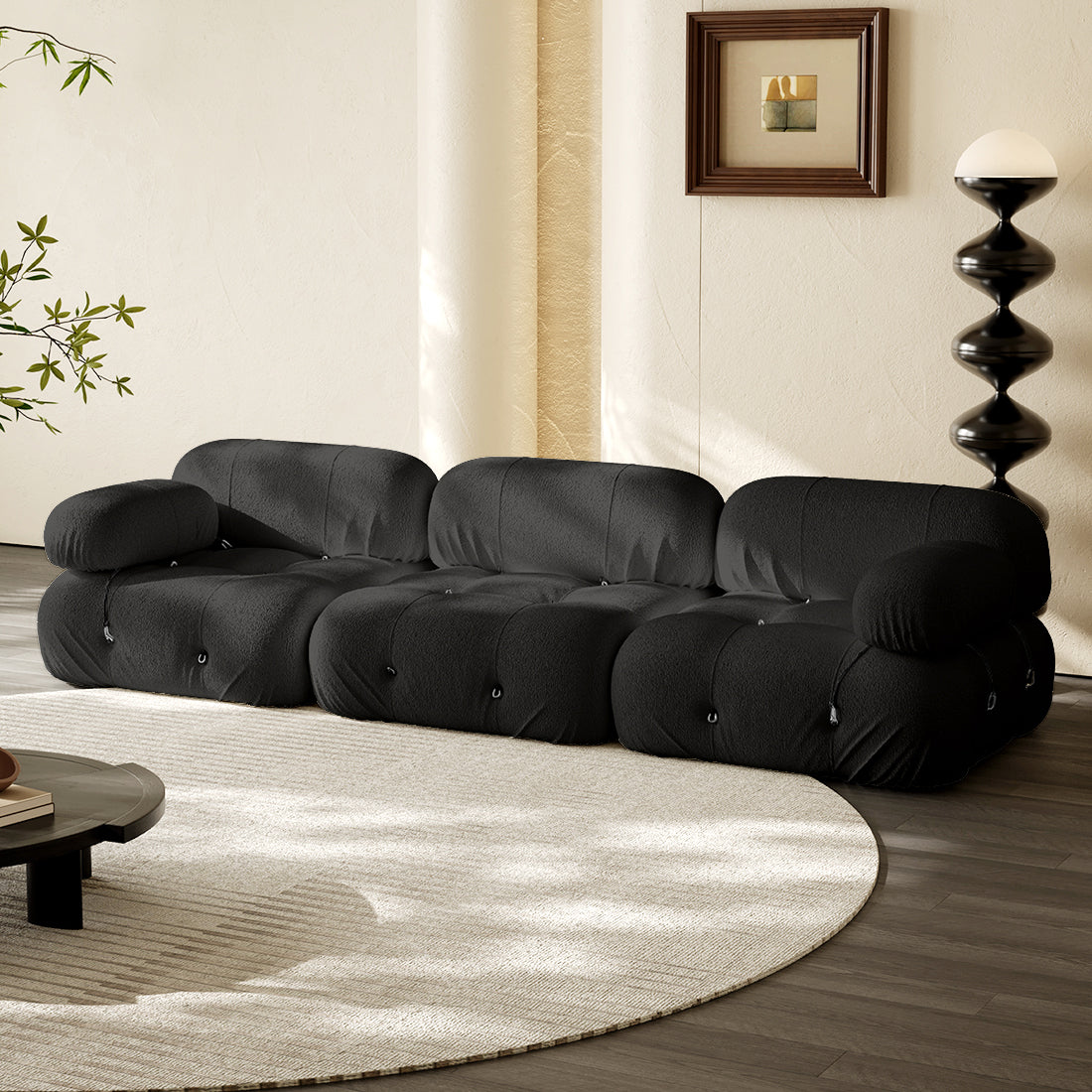 3-seater straight sofa in dark charcoal fabric with tufted cushions and rolled arms.