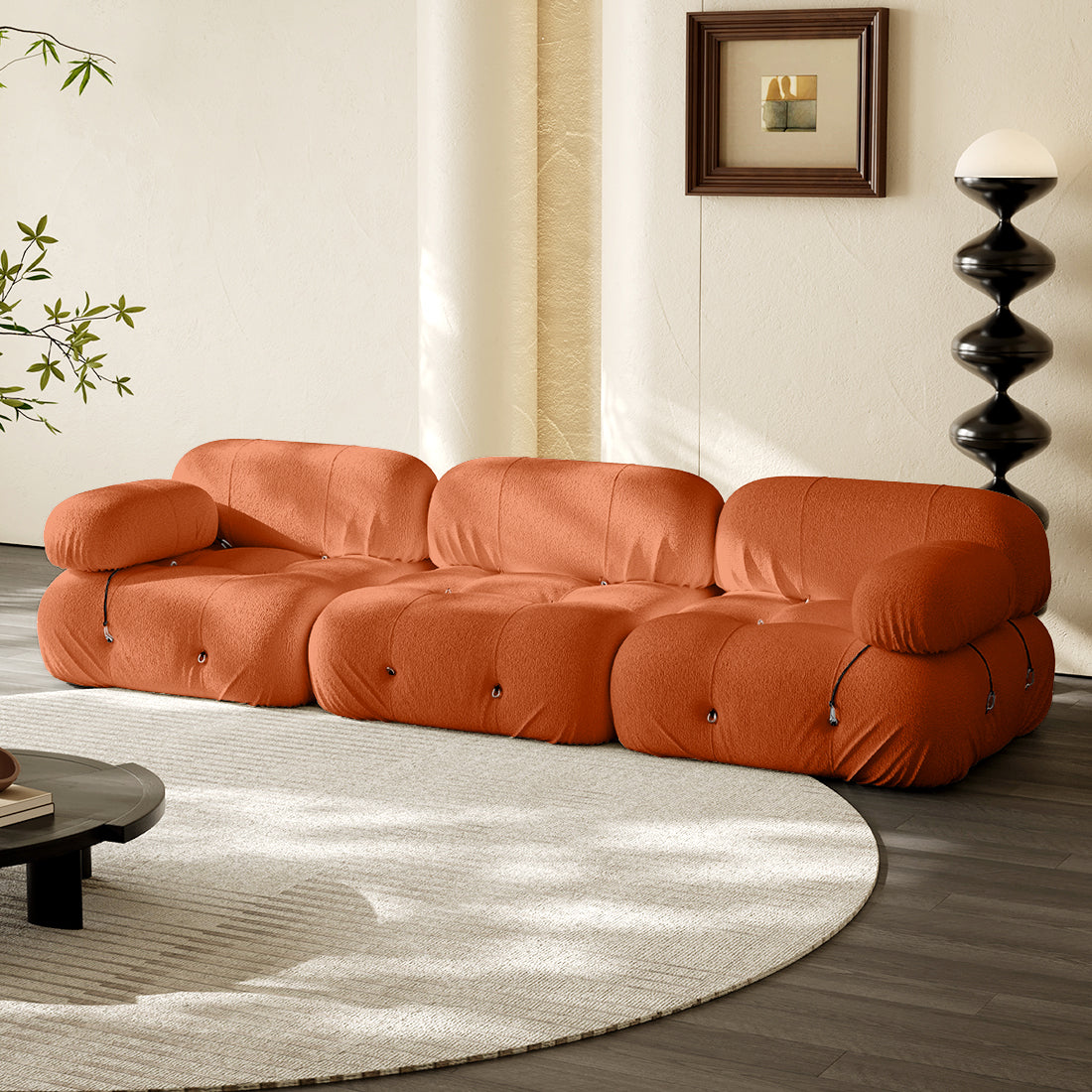 3-seater straight sofa in orange fabric with tufted cushions and rolled arms.