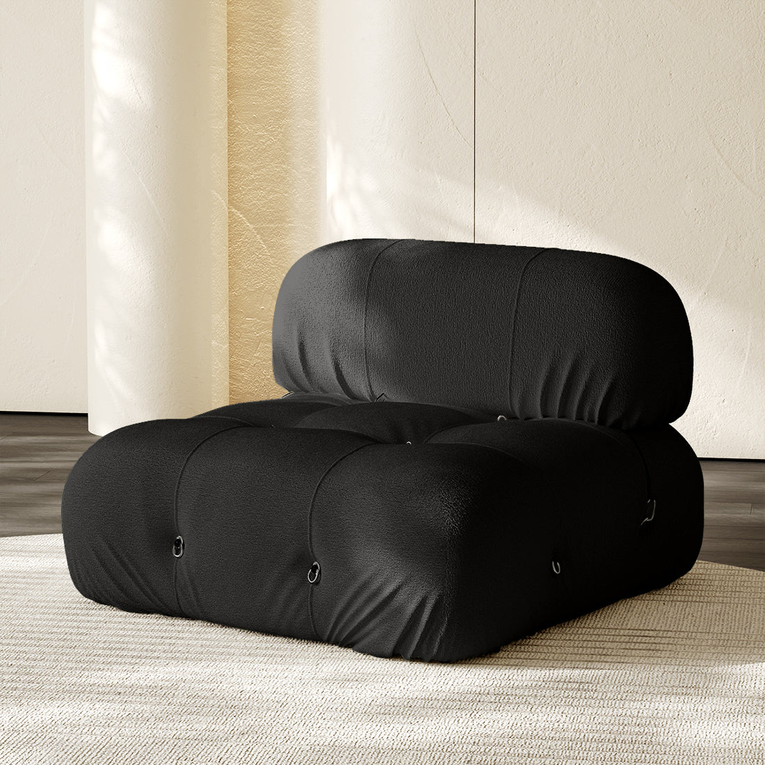 Hiksnra Camaleonda sofa.armless module in black chenille,with a padded backrest and soft,supportive foam.