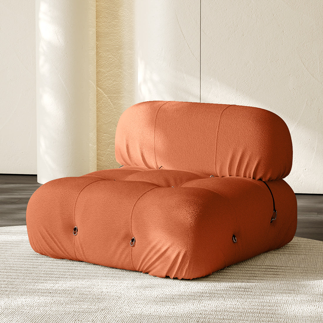 Hiksnra Camaleonda sofa.armless module in orange chenille,with a padded backrest and soft,supportive foam.