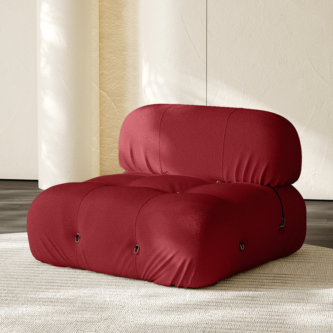 Hiksnra Camaleonda sofa.armless module in red chenille,with a padded backrest and soft,supportive foam.