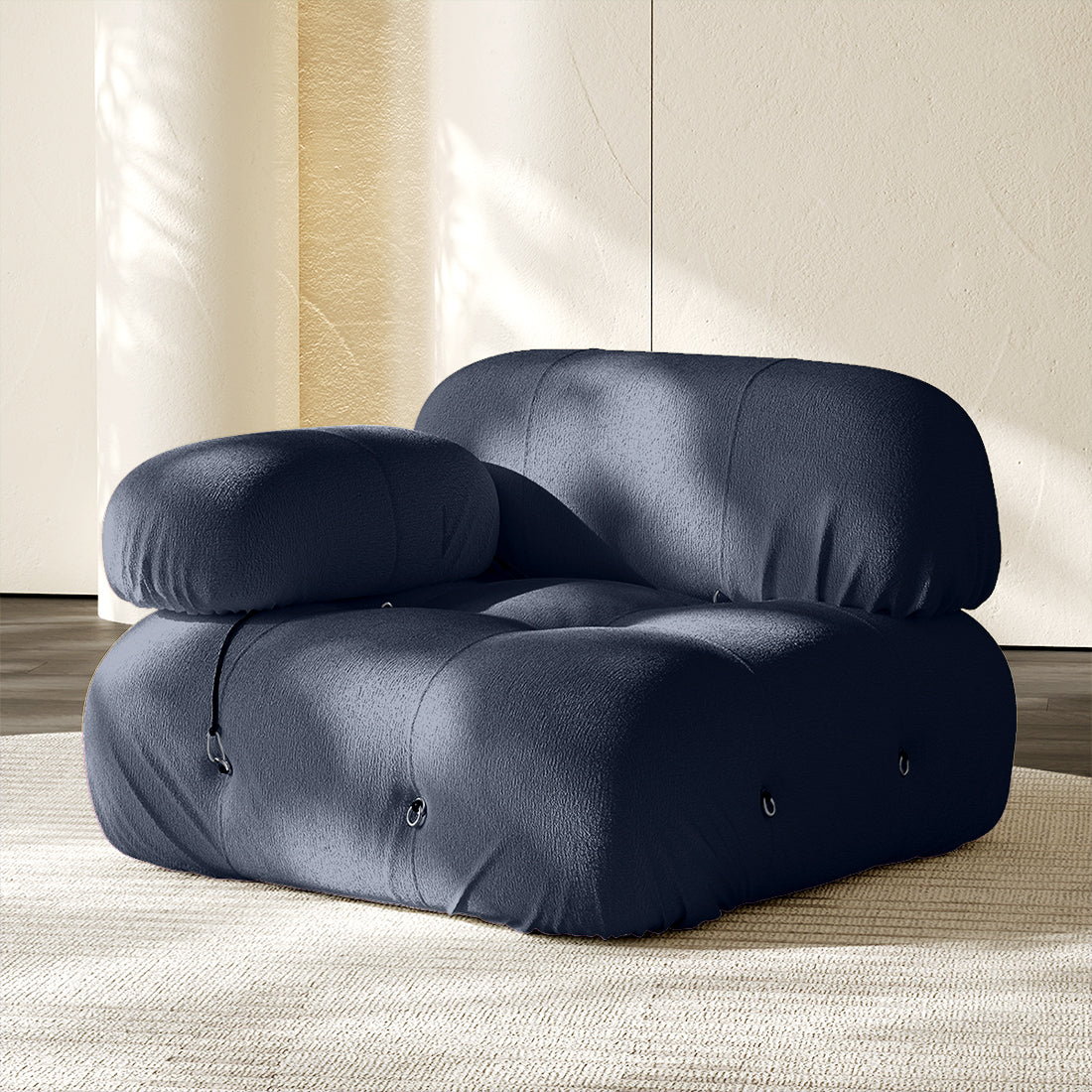 Hiksnra Camaleonda sofa.corner module in blue chenille,with a rounded armrest for flexible modular layouts.