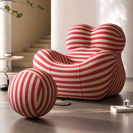 Hiksnra La Mamma UP5_6 lounge chair with a matching round ottoman, featuring blue and beige striped upholstery and a sculptural design.