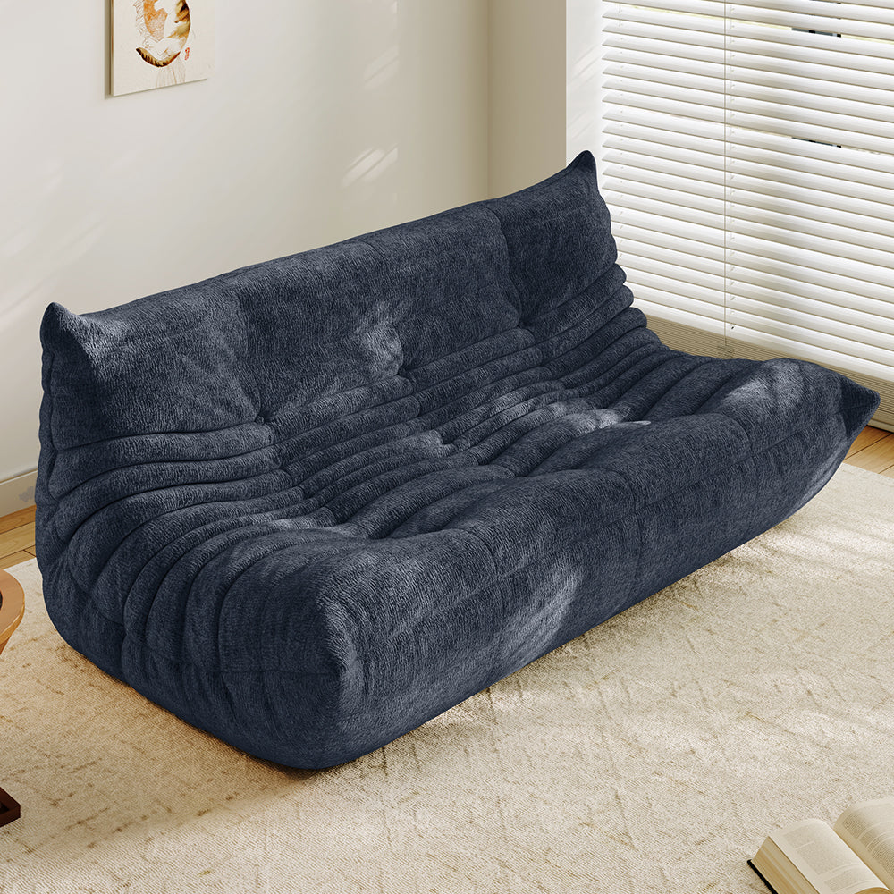 3-seater sofa bed in dark blue, tufted back and ribbed padded seat with curved arms
