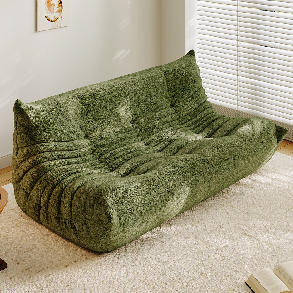 3-seater sofa bed in grass green, tufted back and ribbed padded seat with curved arms