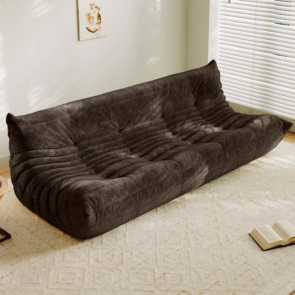 4-seater vacuum-packed sofa in brown, tufted cushions and ribbed backrest.